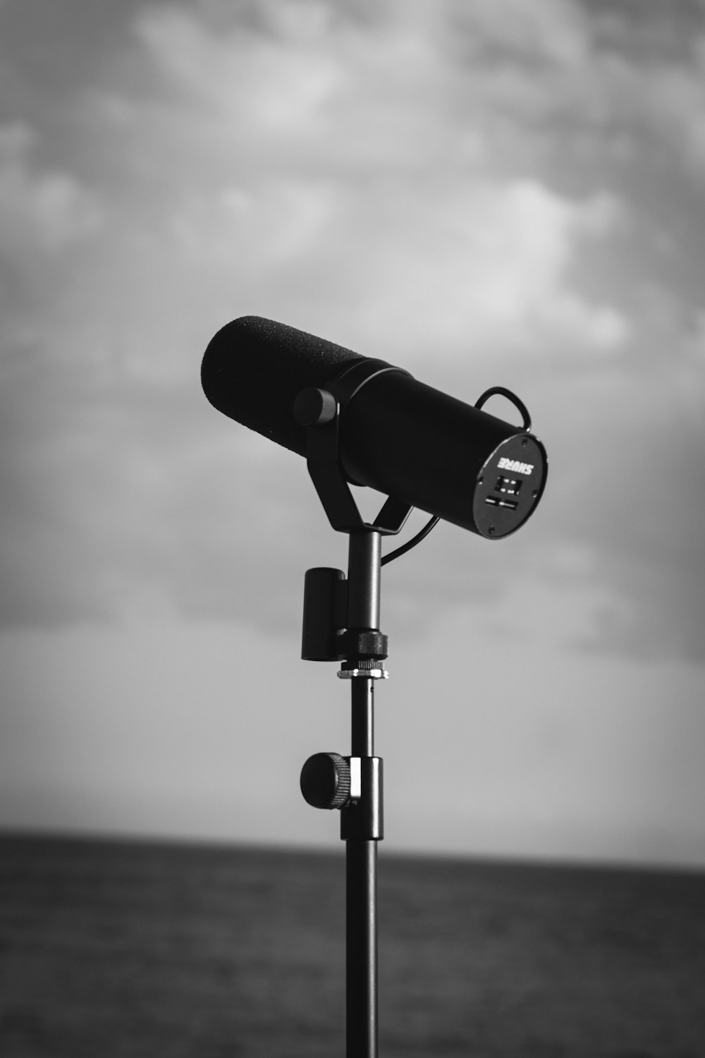 a black and white photo of a telescope