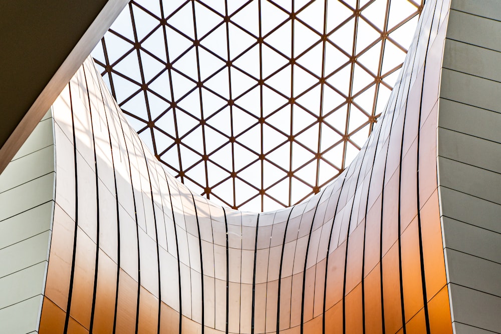 a view of the ceiling of a building from below