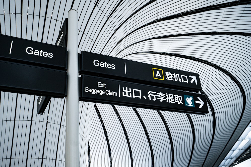 a couple of signs that are in front of a building