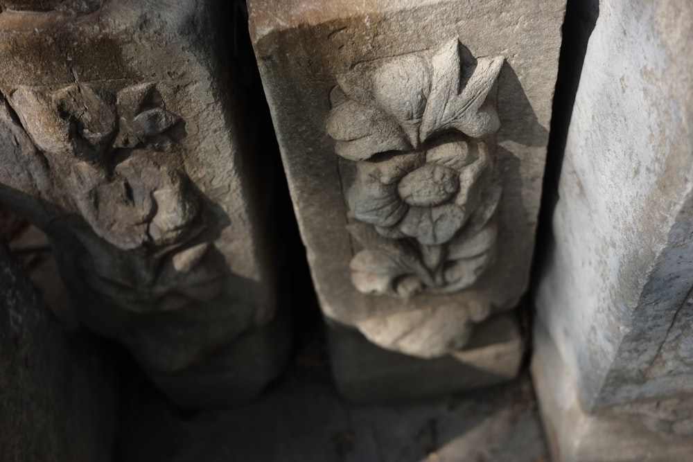 a close up of a carving on a wall