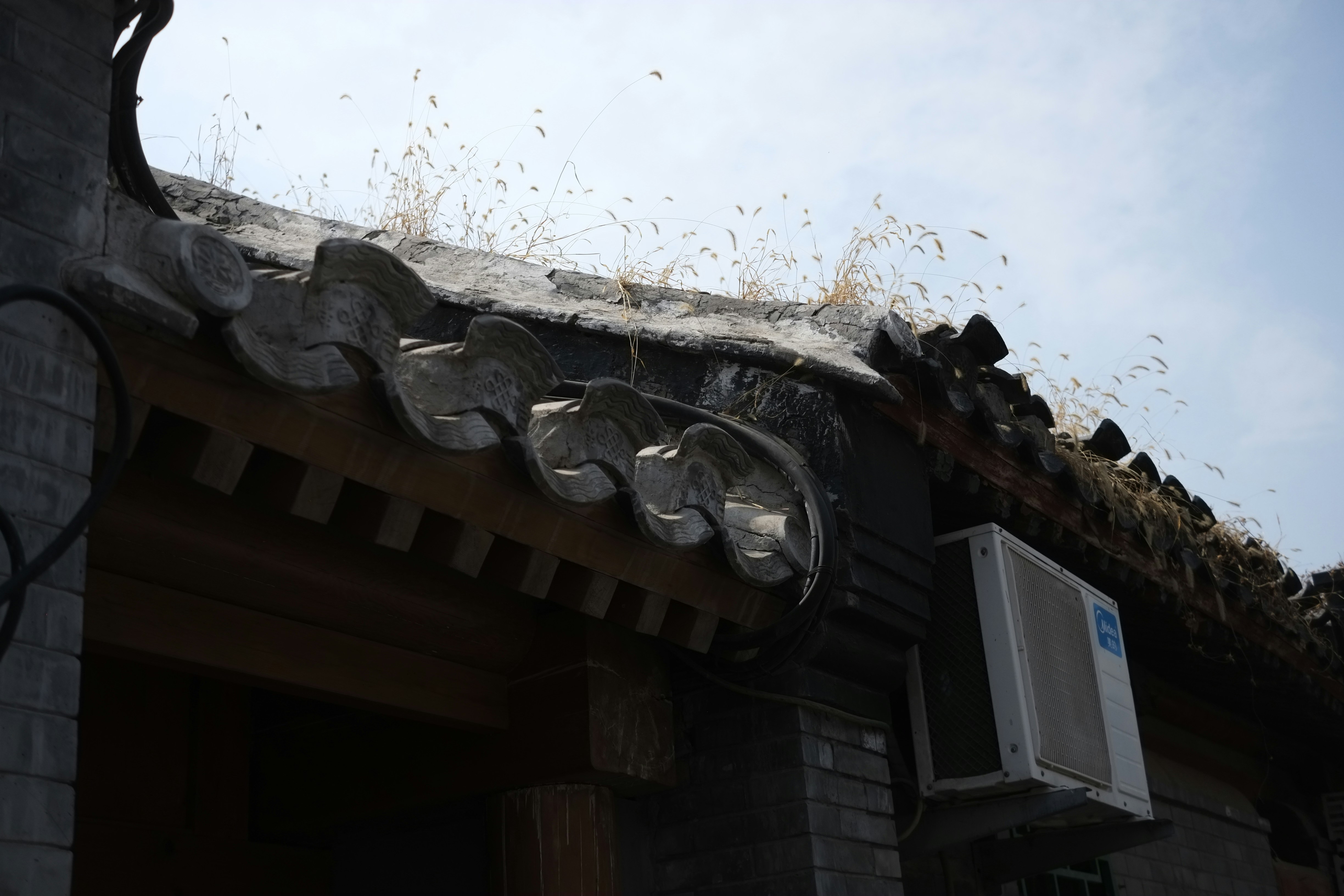 the roof of a building with a air conditioner on top of it