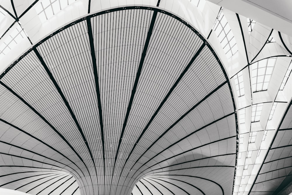 a black and white photo of a train station