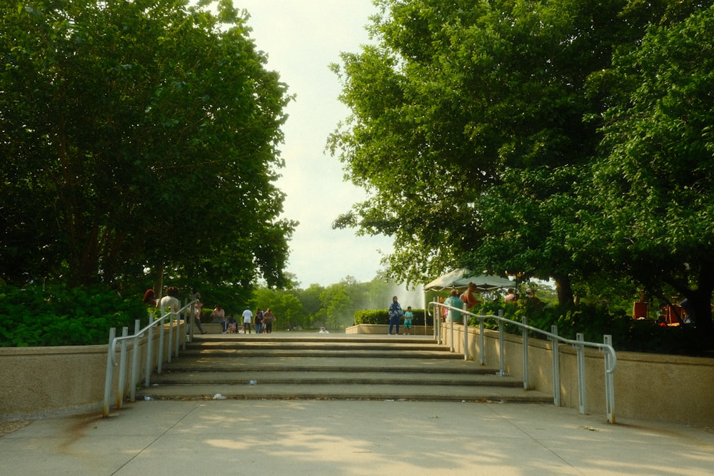 a group of people walking down a set of stairs