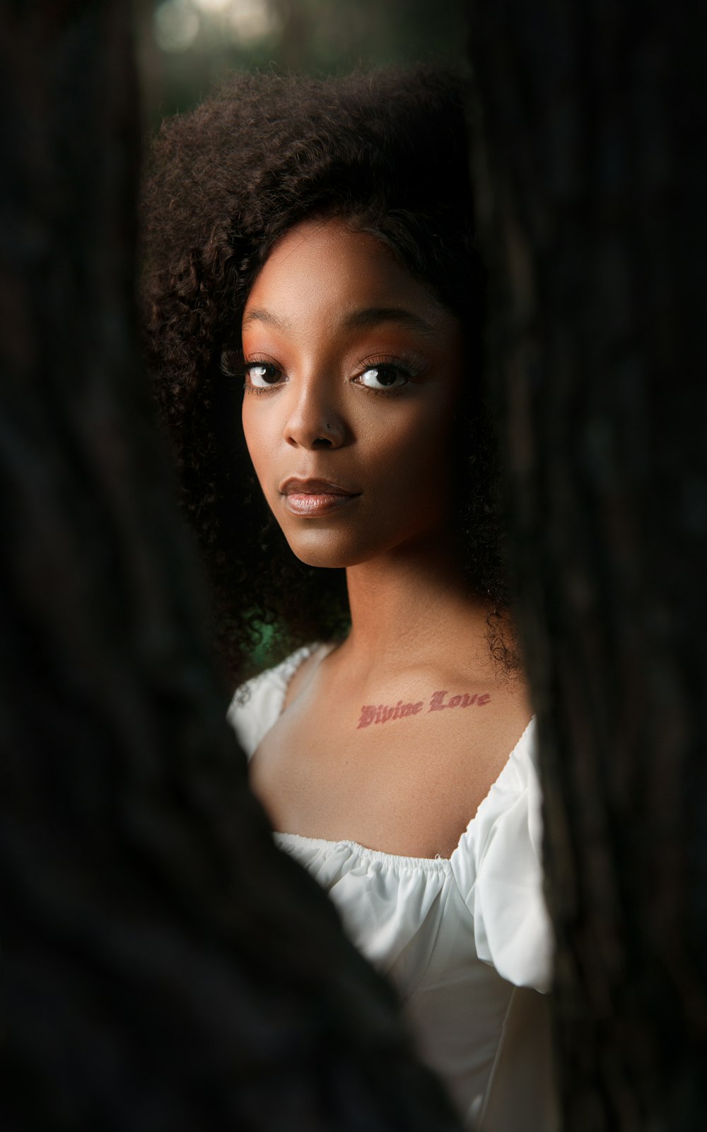 a woman with a tattoo on her chest