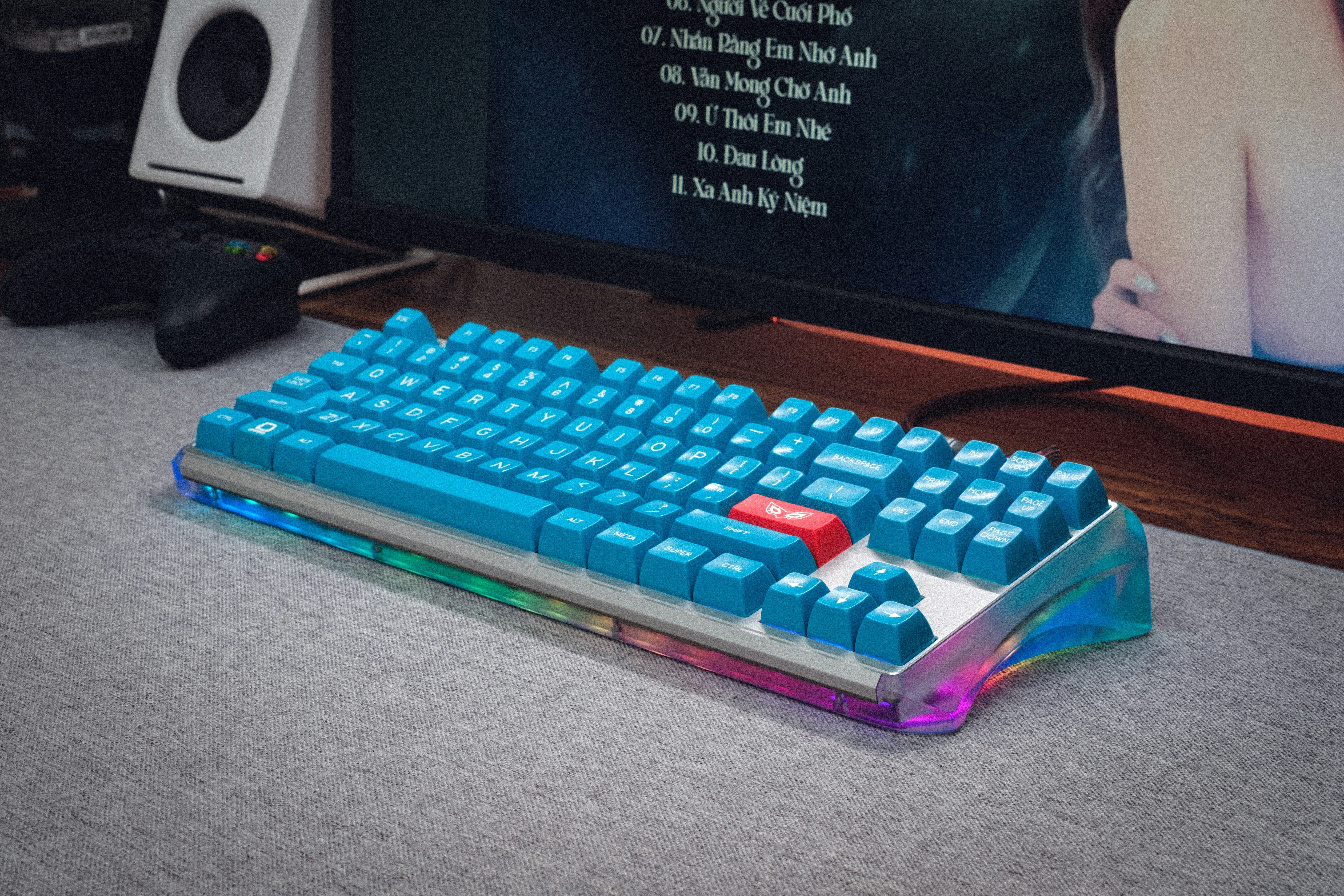 a computer keyboard sitting on top of a desk