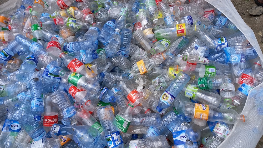 a large amount of bottled water in a plastic container
