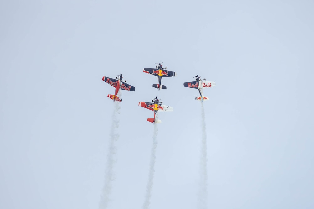 a group of airplanes flying in formation in the sky