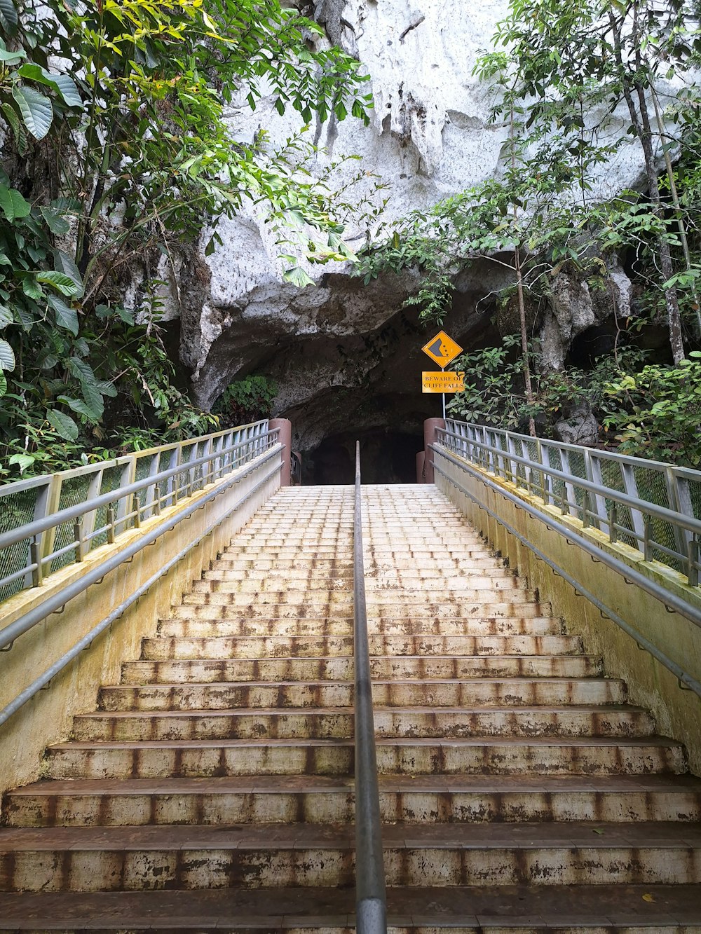 a set of stairs leading into a cave