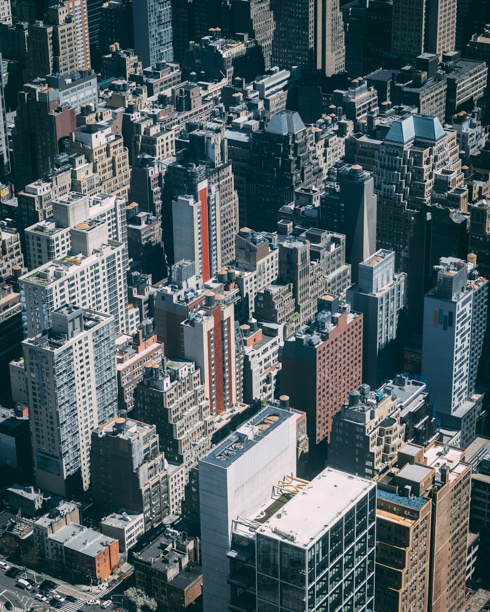 an aerial view of a city with tall buildings