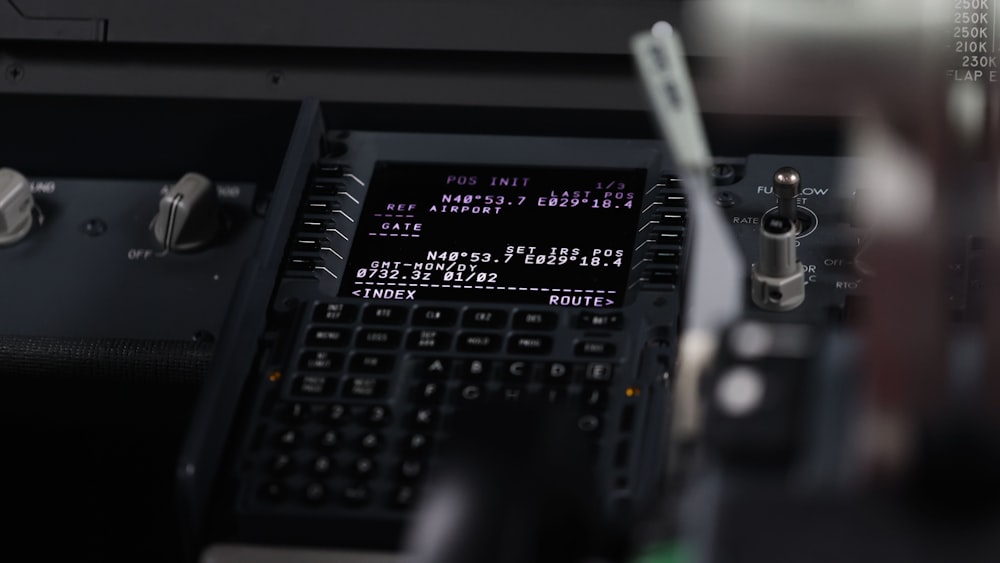 a close up of a control panel of a plane