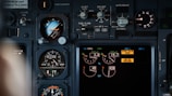 the cockpit of a plane with a lot of instruments