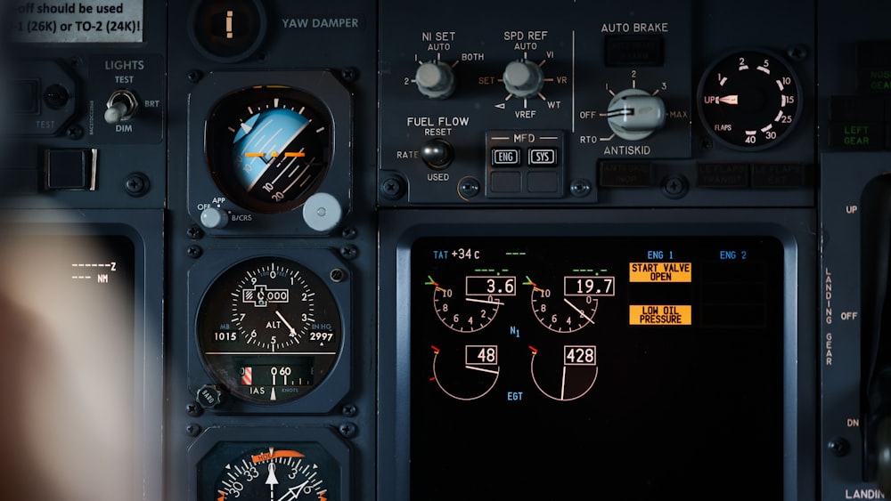 the cockpit of a plane with a lot of instruments