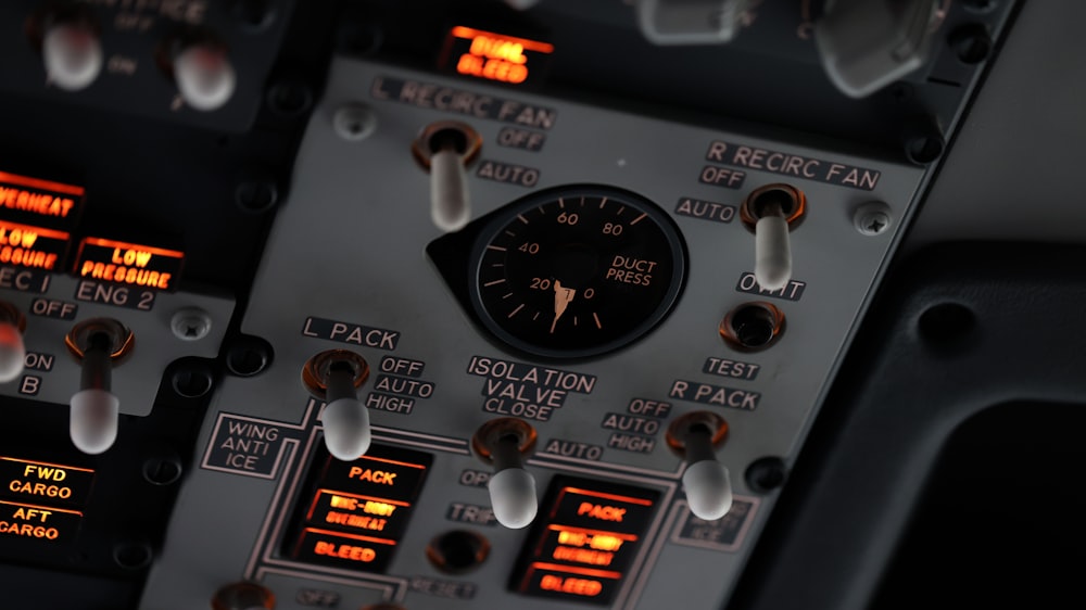 a close up of a control panel in a plane