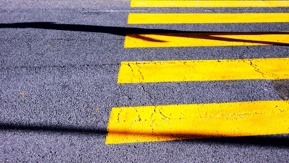 a street with yellow lines painted on it