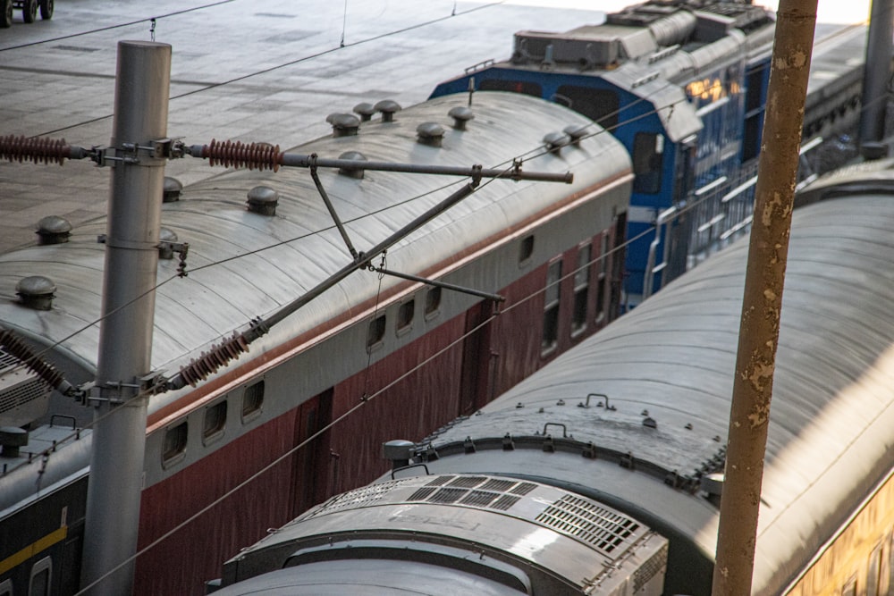 a couple of trains that are next to each other