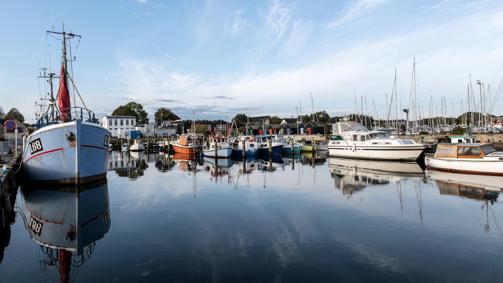 a group of boats that are sitting in the water