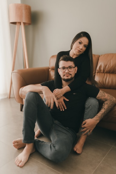 a man and a woman sitting on a couch