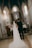 a bride and groom walking down the aisle of a church