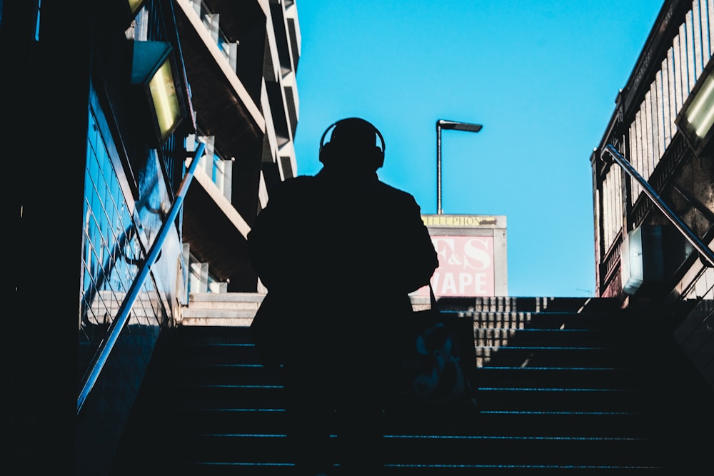 a person walking up a flight of stairs