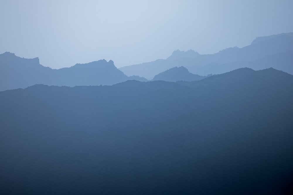 a view of a mountain range from a distance