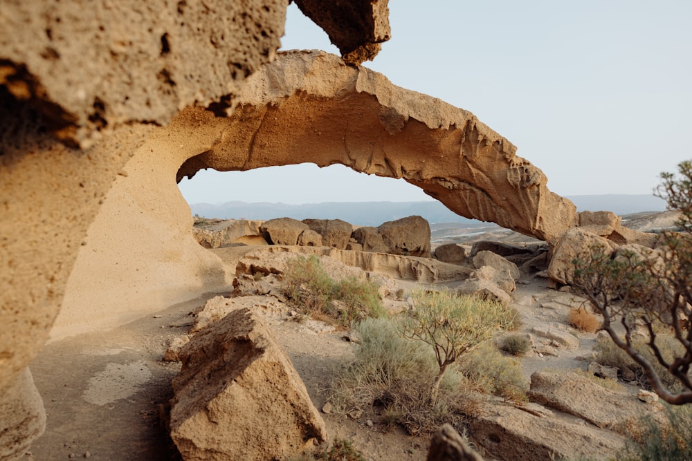 a rock formation in the middle of a desert