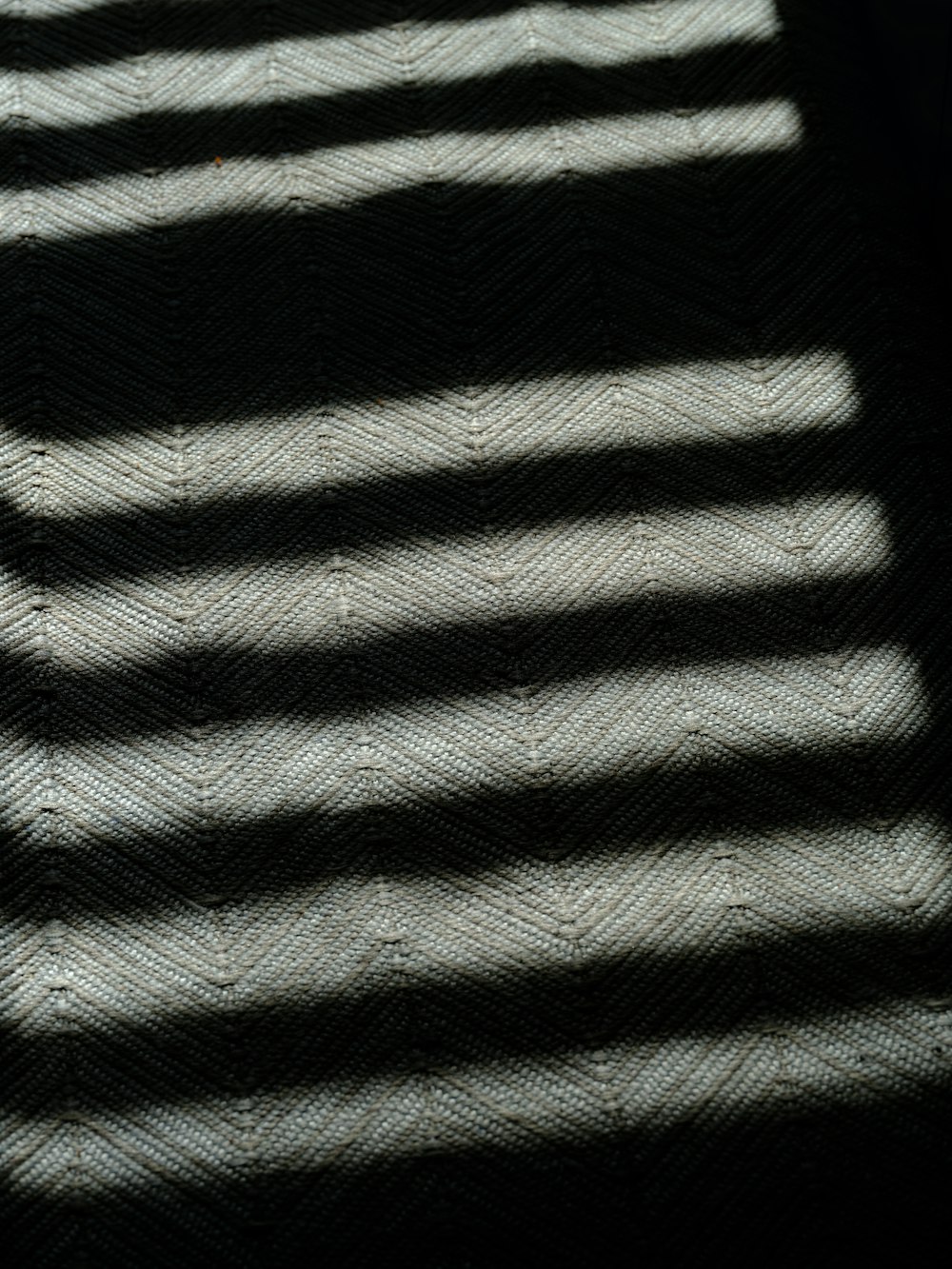 the shadow of a window on a wall