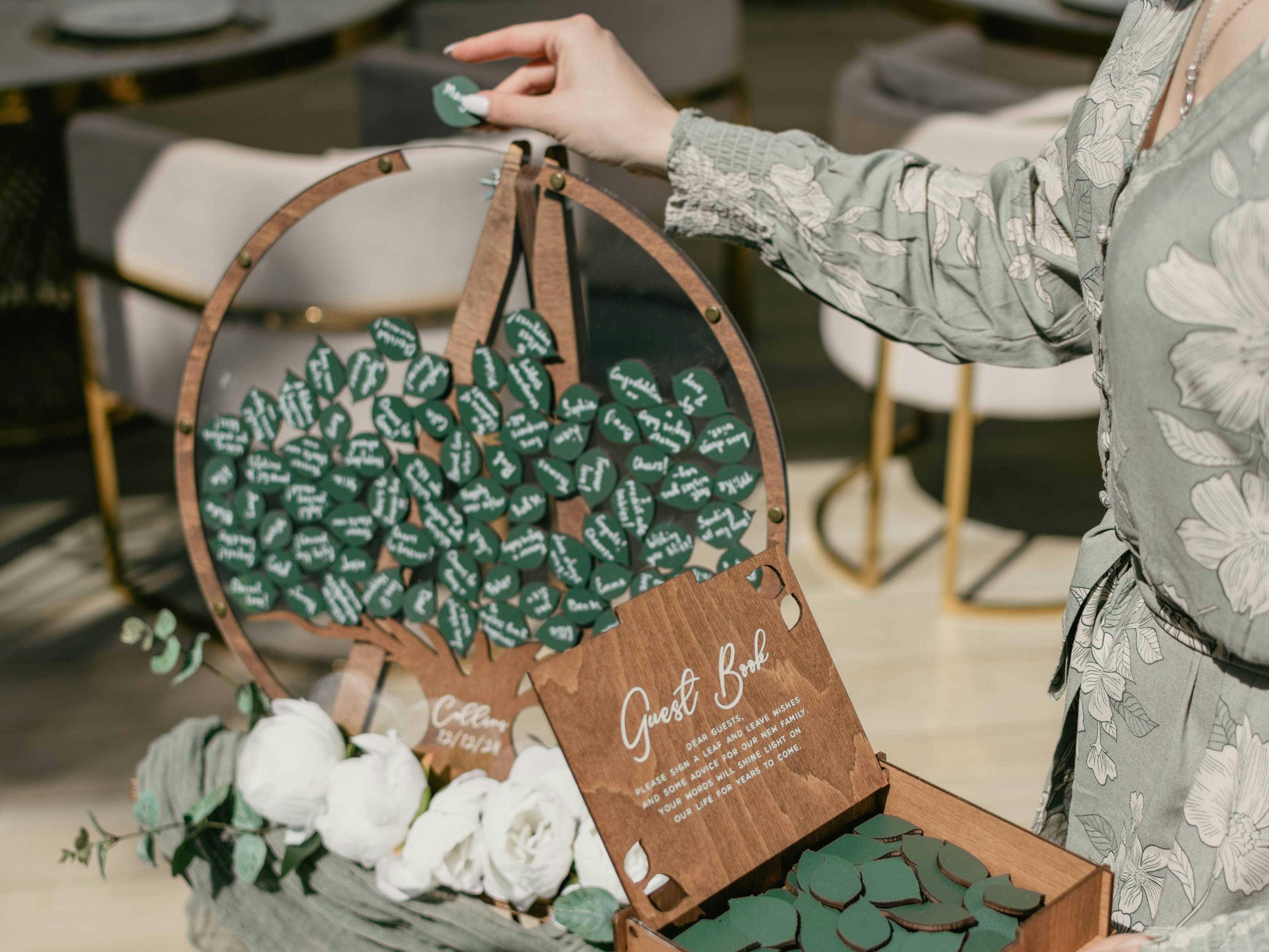 a woman holding a wooden basket filled with flowers