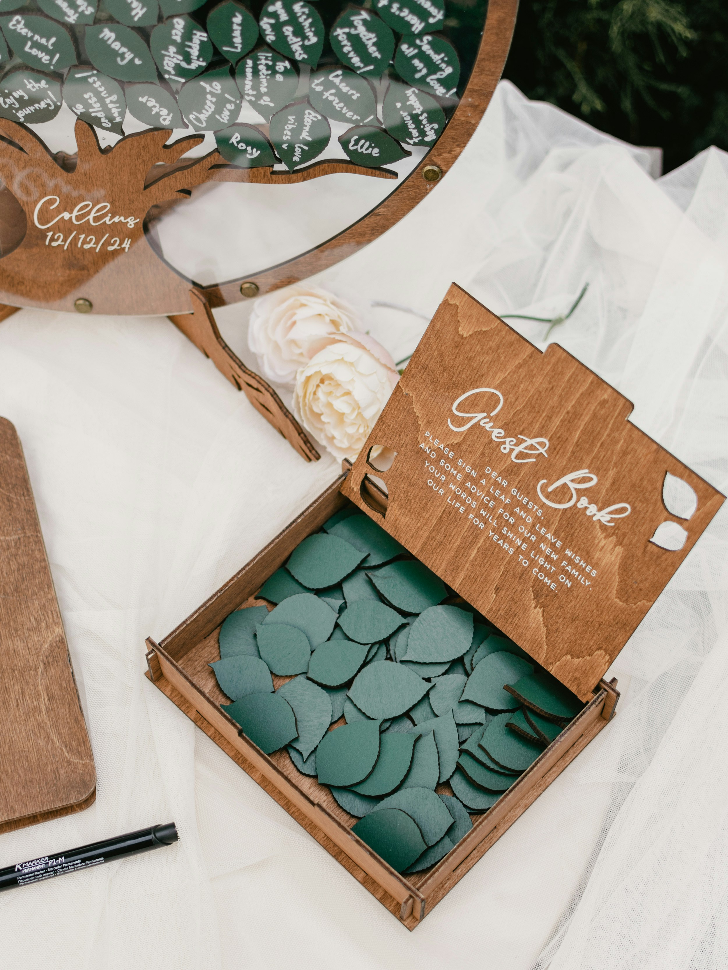 a wooden box filled with lots of green hearts