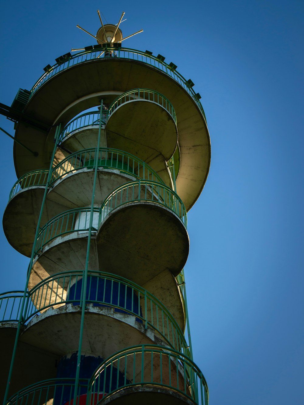 a tall tower with a clock on the top of it