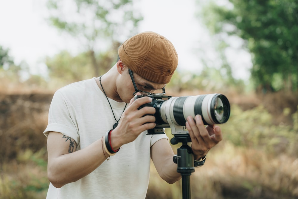 a man taking a picture with a camera