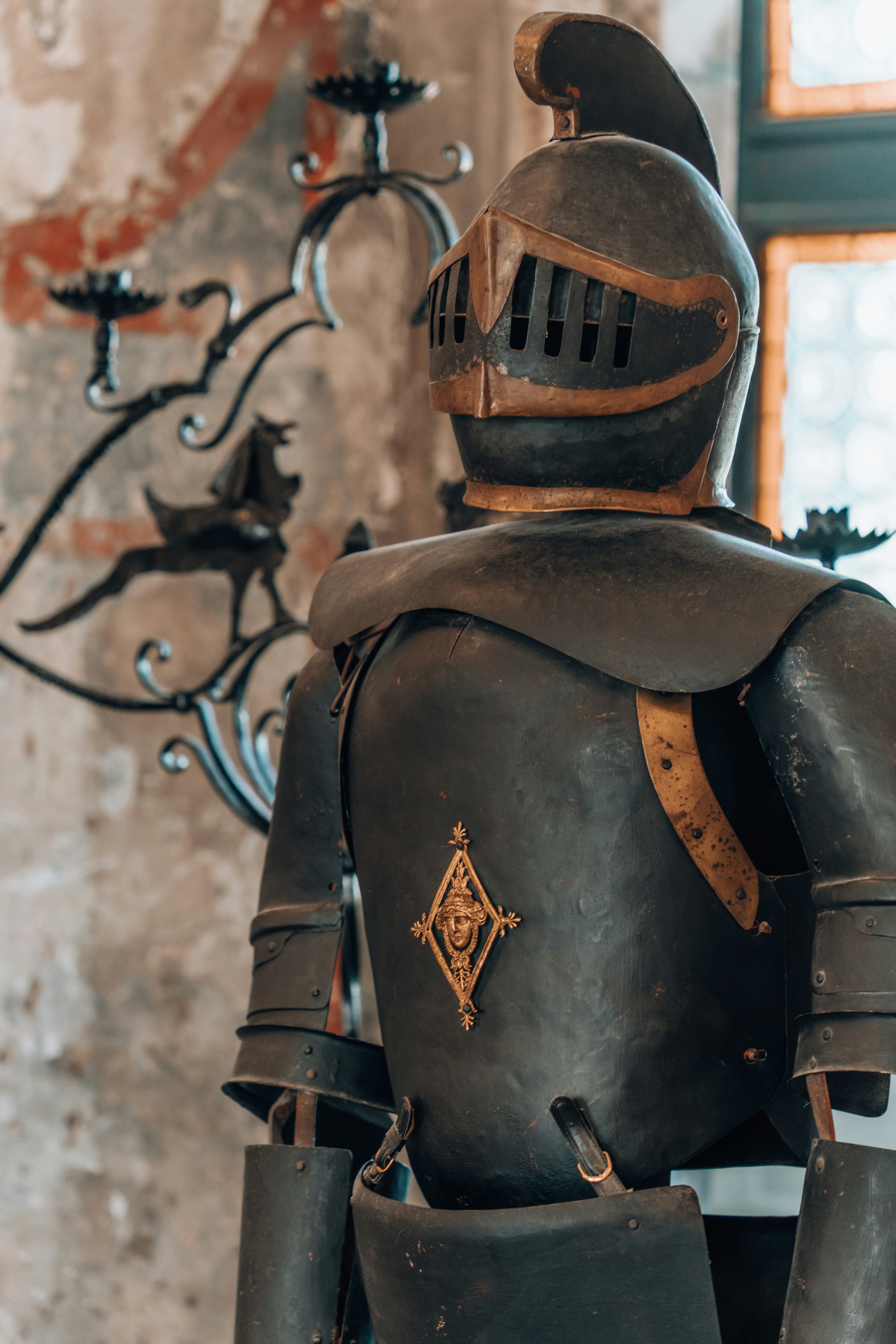 a close up of a statue of a knight