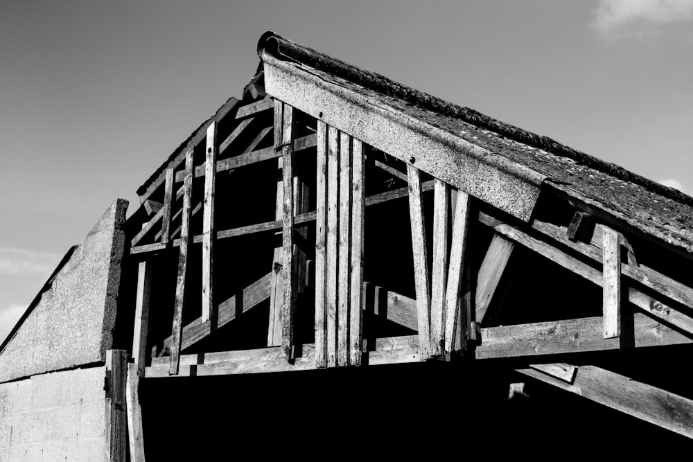 a black and white photo of a wooden structure