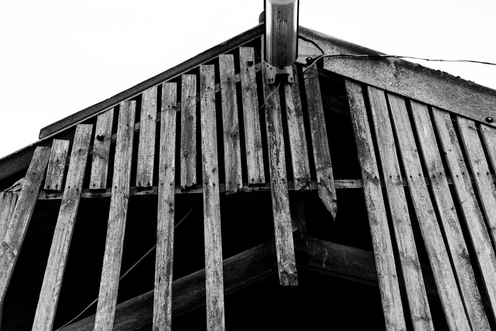 a black and white photo of a wooden structure