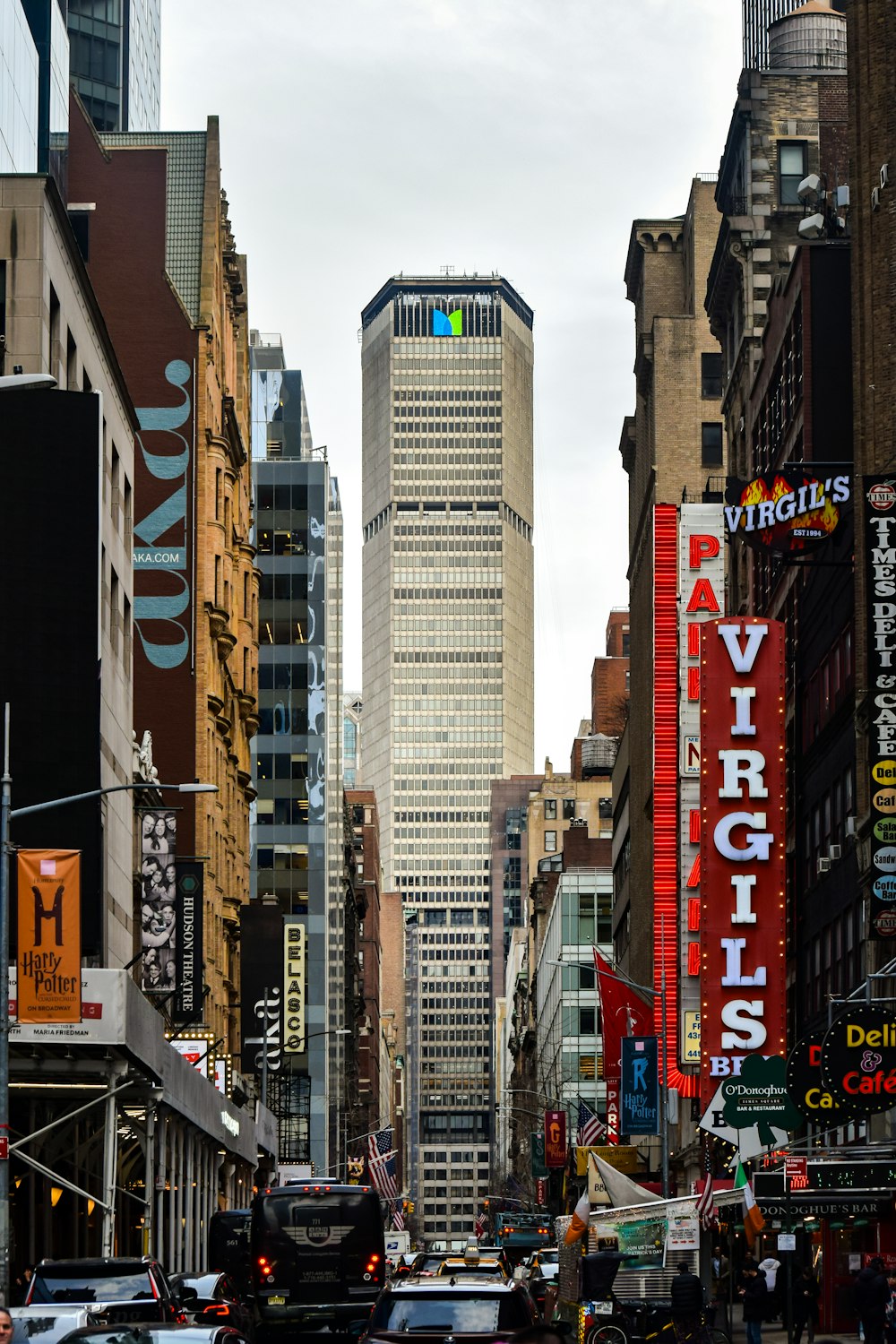 a city street filled with lots of tall buildings