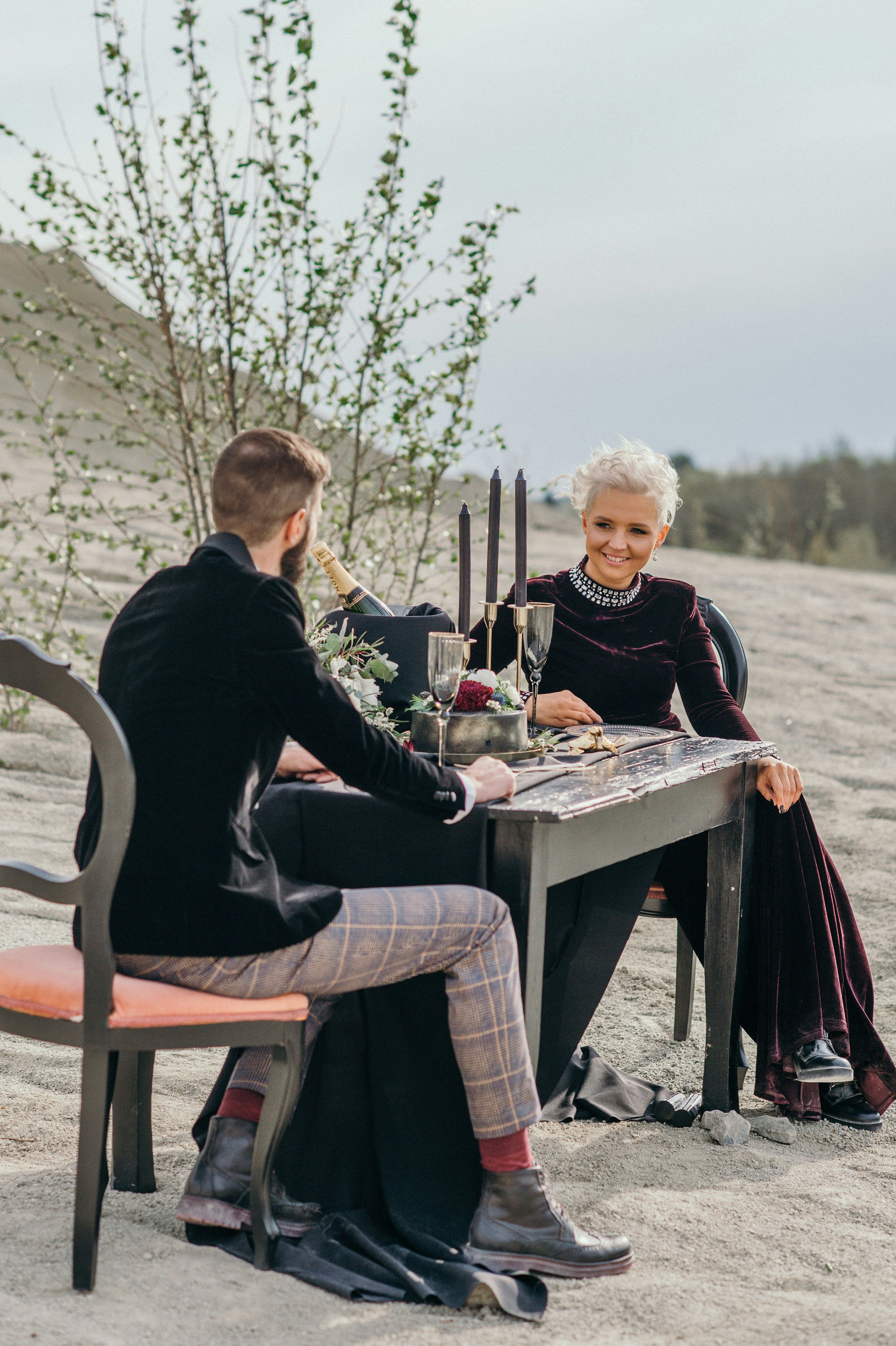 a man and a woman sitting at a table