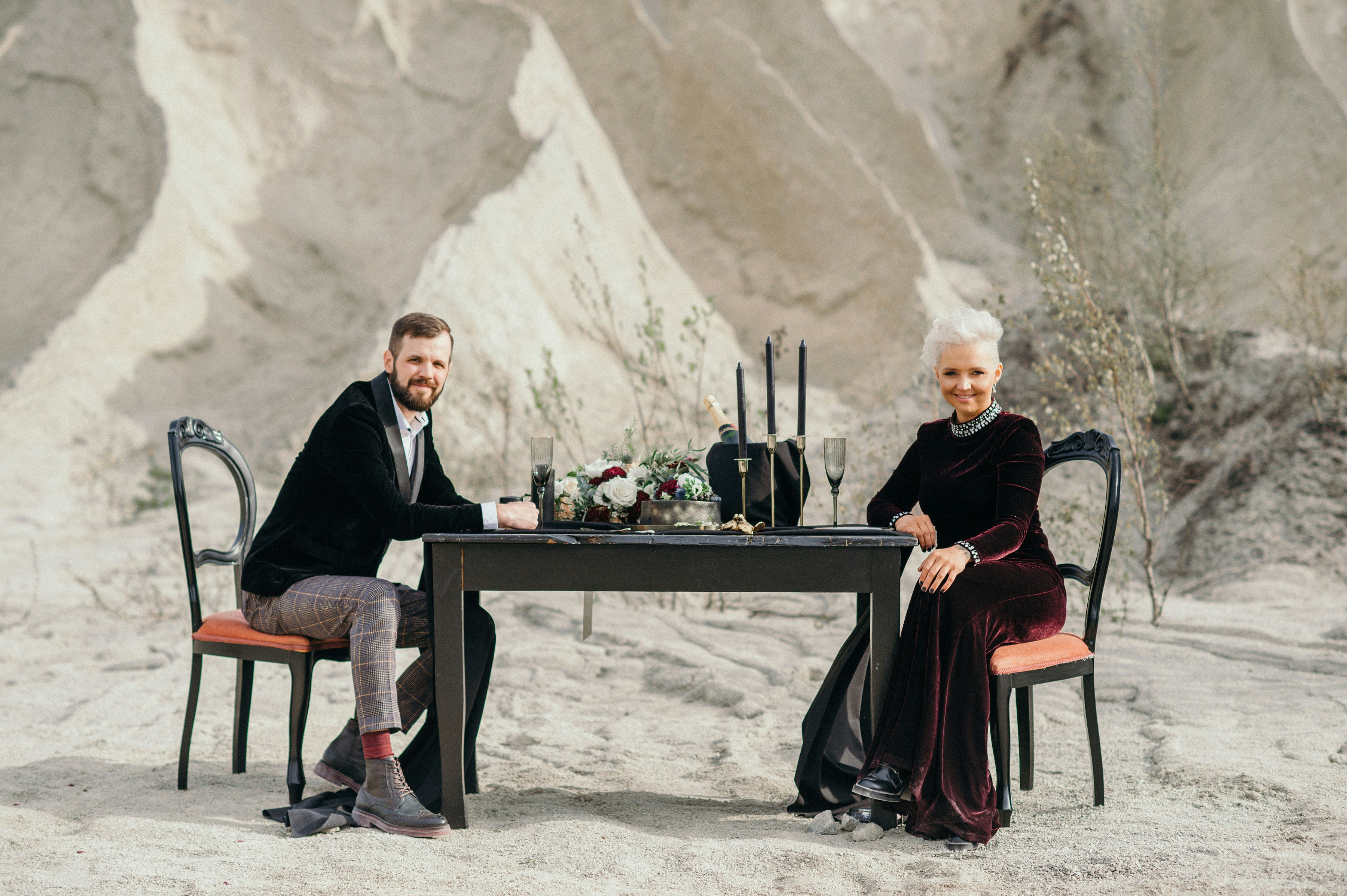 a man and a woman sitting at a table