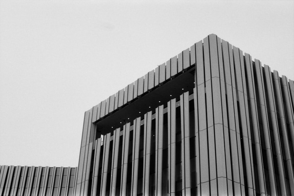 a black and white photo of a tall building