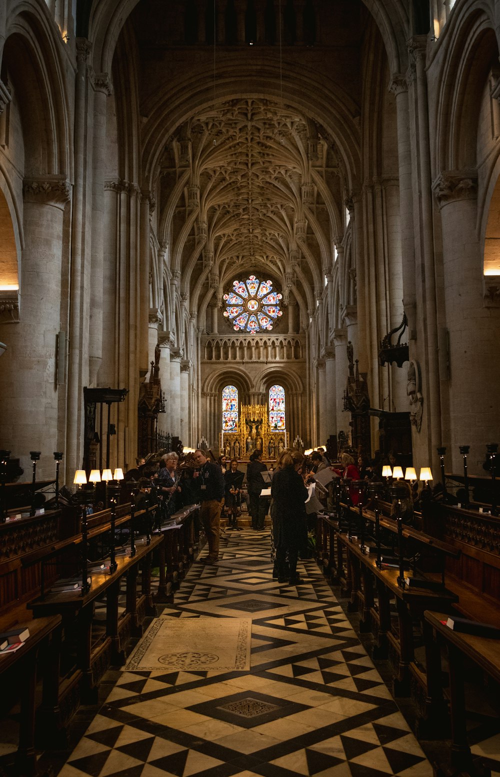 a large cathedral with a black and white checkered floor