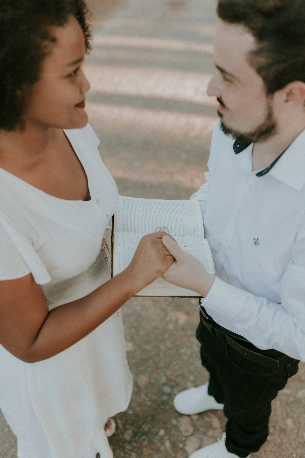 a man and a woman standing next to each other