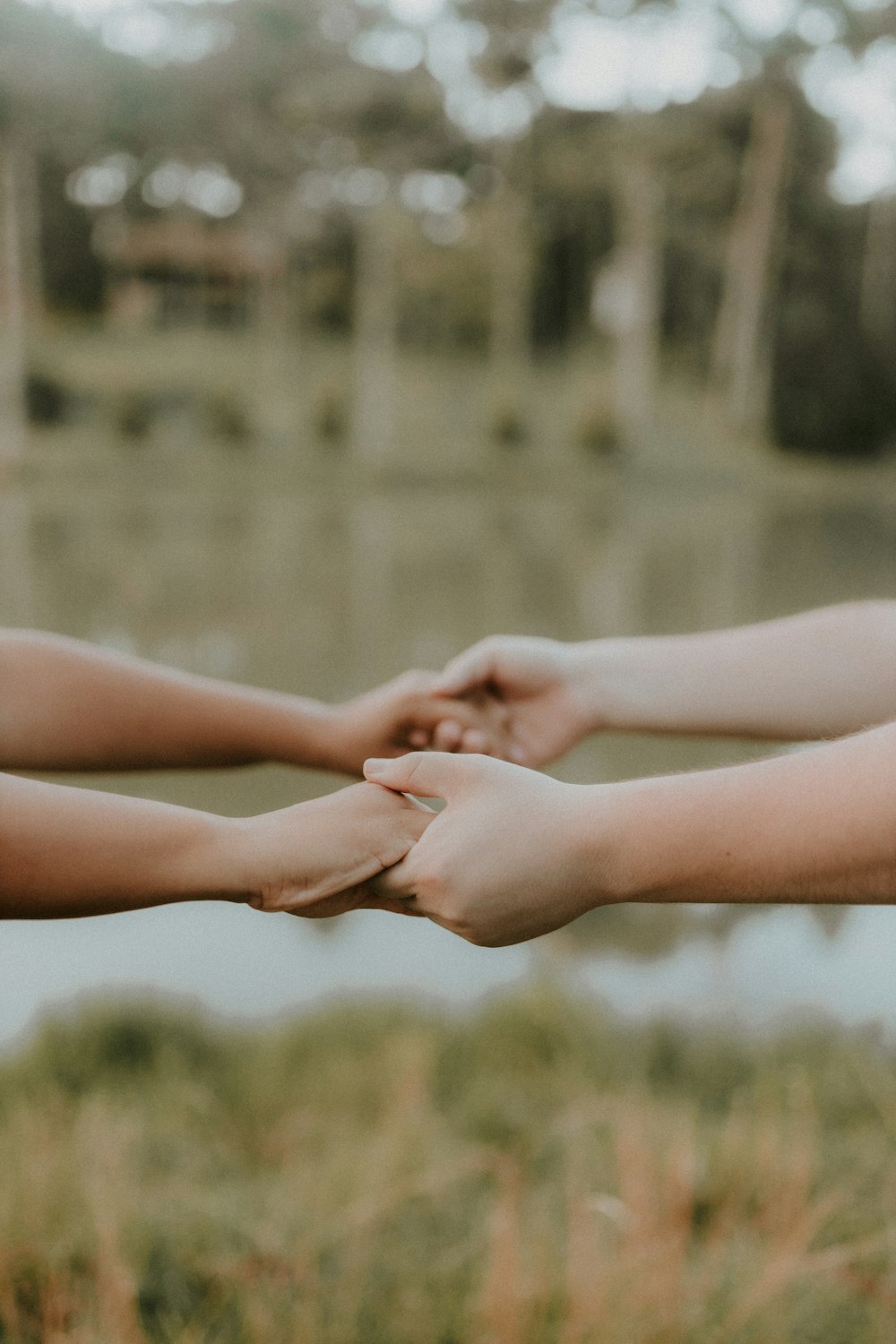 a couple of people that are holding hands