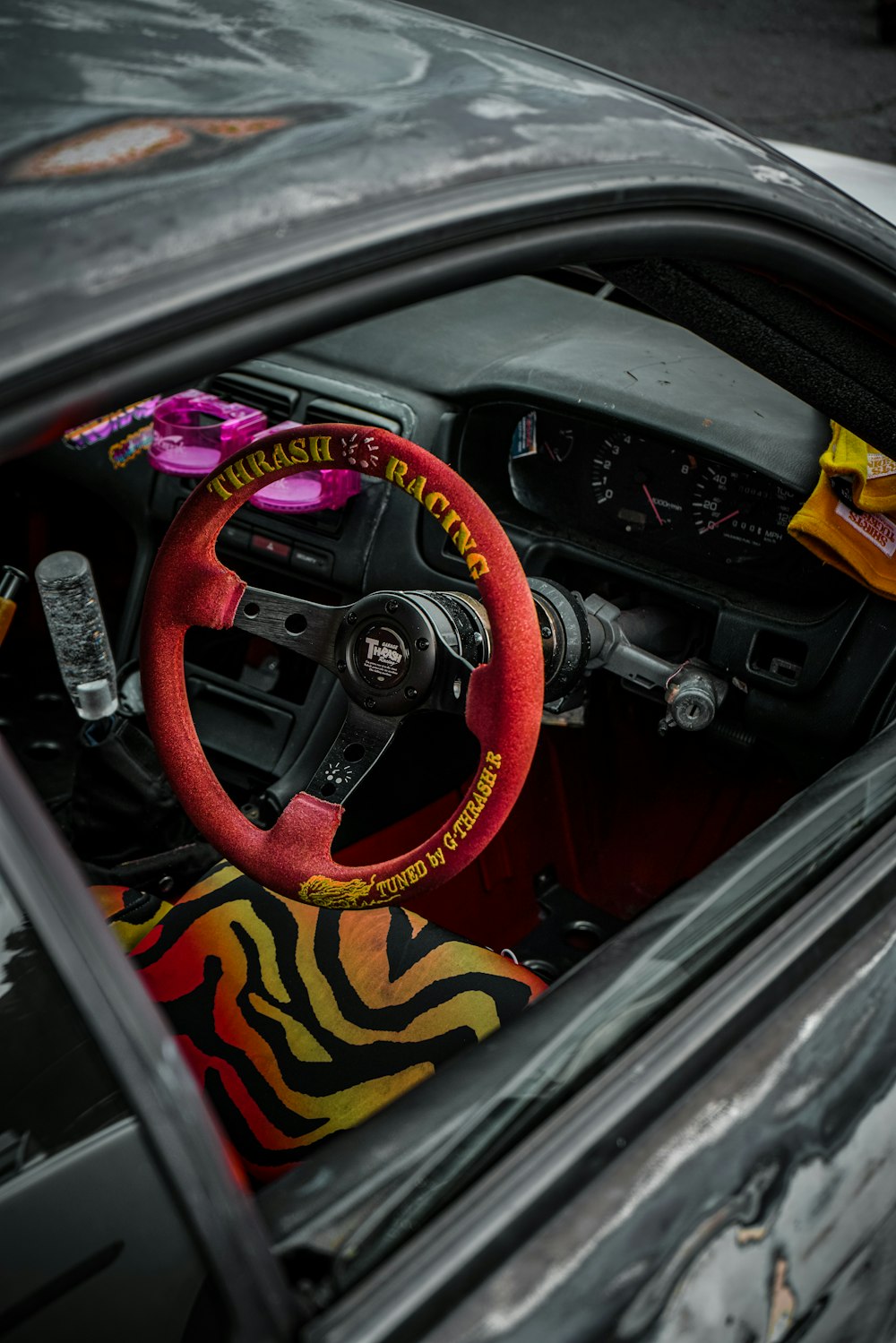 the interior of a car with a steering wheel