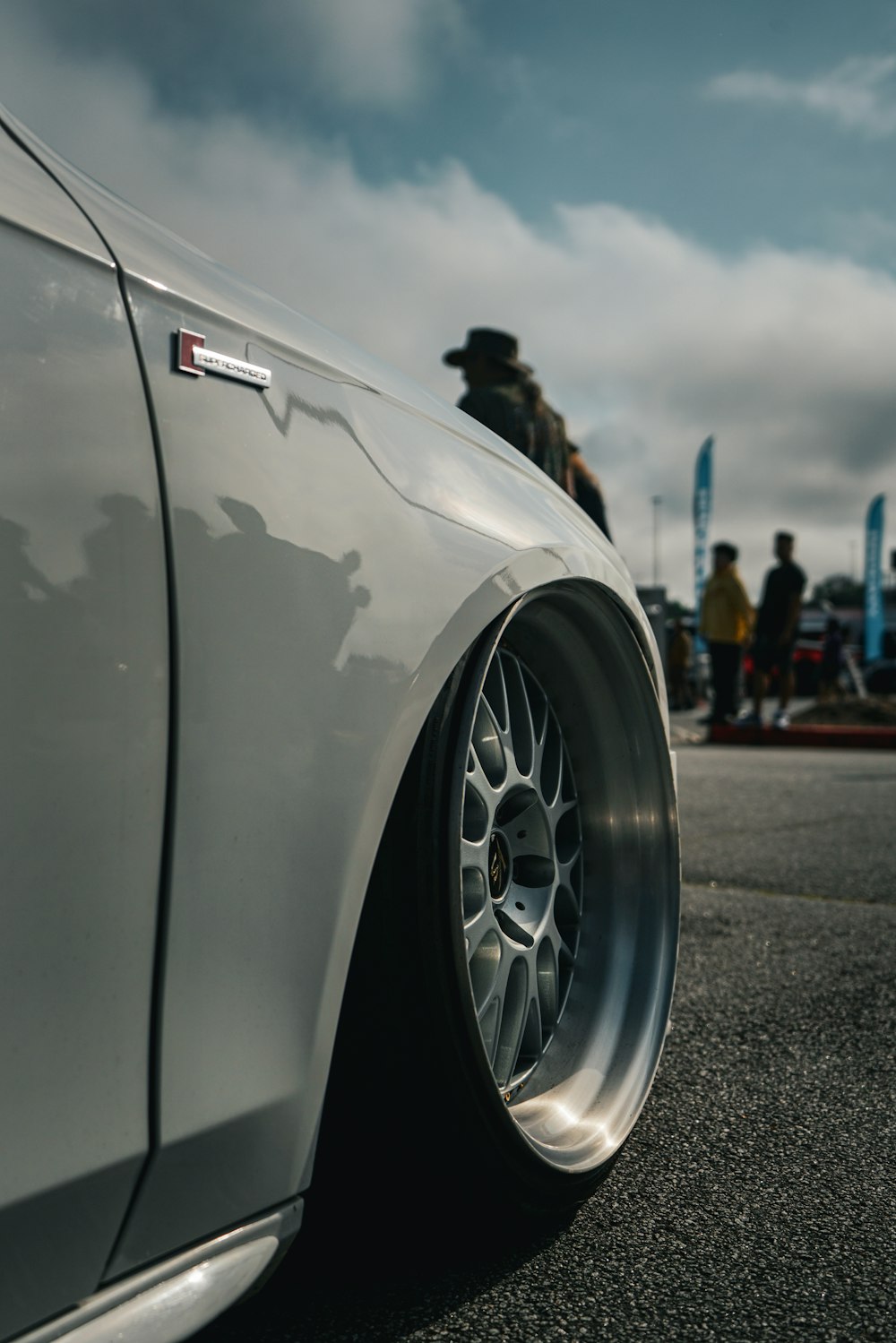 a close up of a car tire on a street