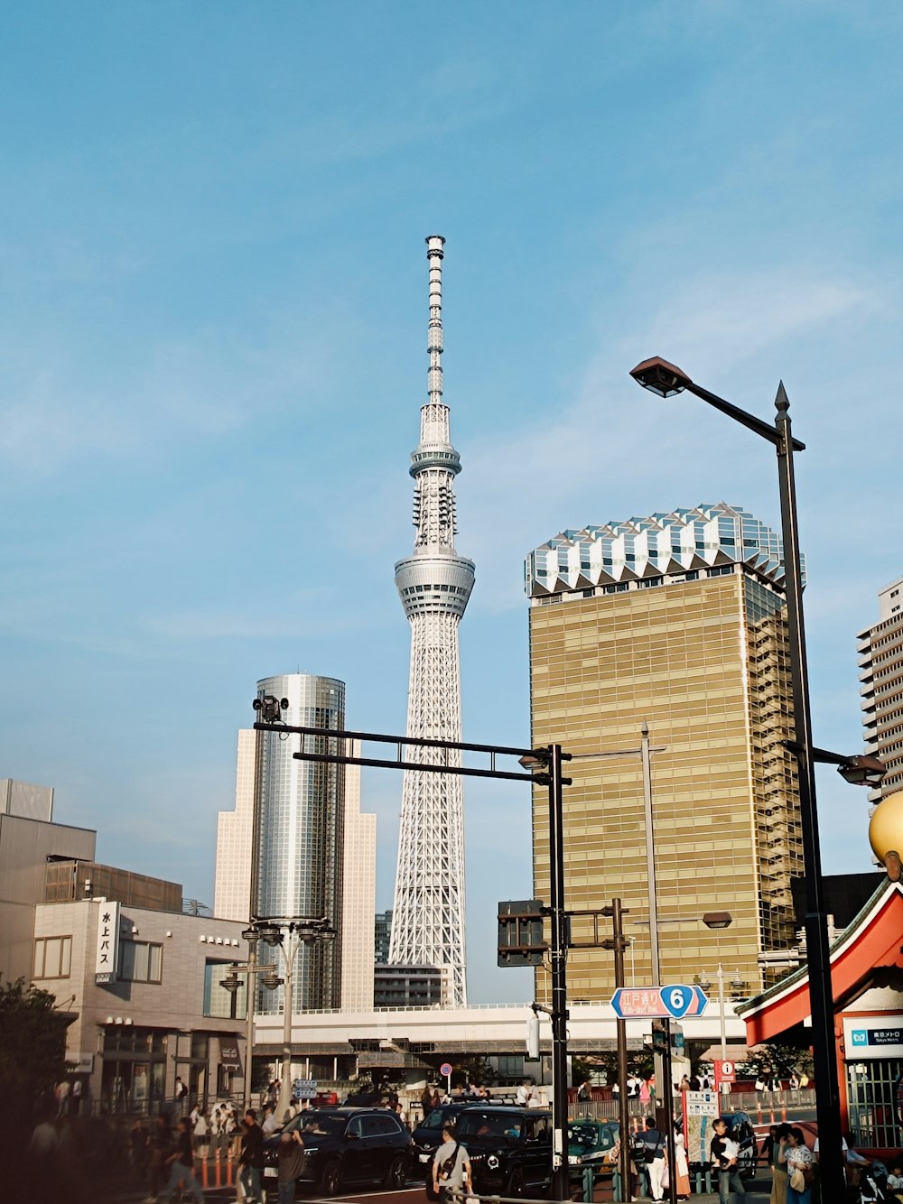 a very tall tower towering over a city