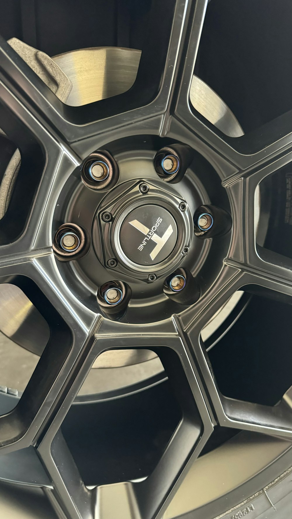 a close up of a wheel on a vehicle