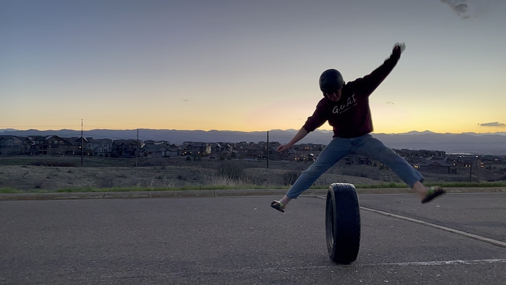 a person jumping in the air on a skateboard