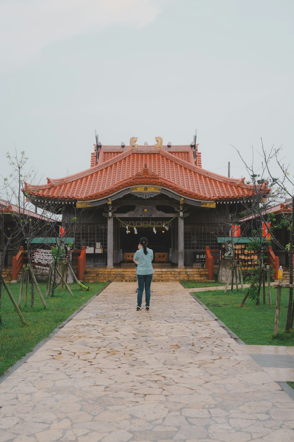 a person standing in front of a building