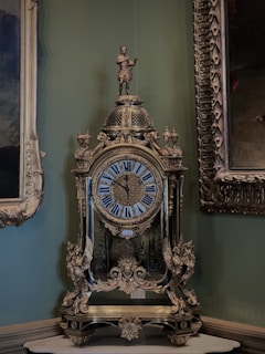 a clock sitting on top of a table in a room