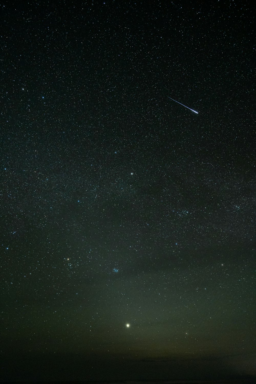 the night sky with stars and the moon