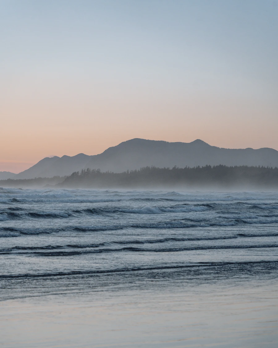 Open grey water and distant mountains near Tofino, British Columbia