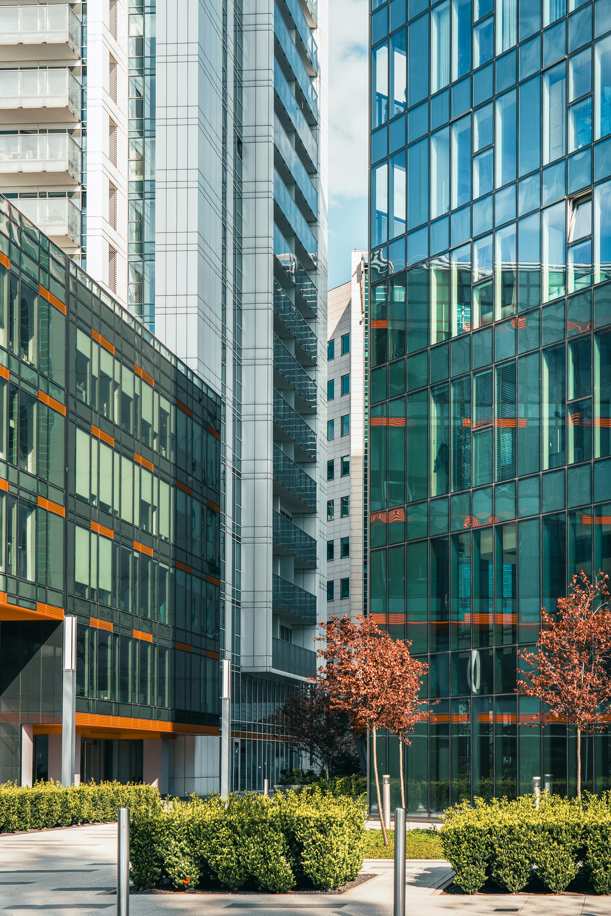 woman wearing yellow long-sleeved dress under white clouds and blue sky during daytime